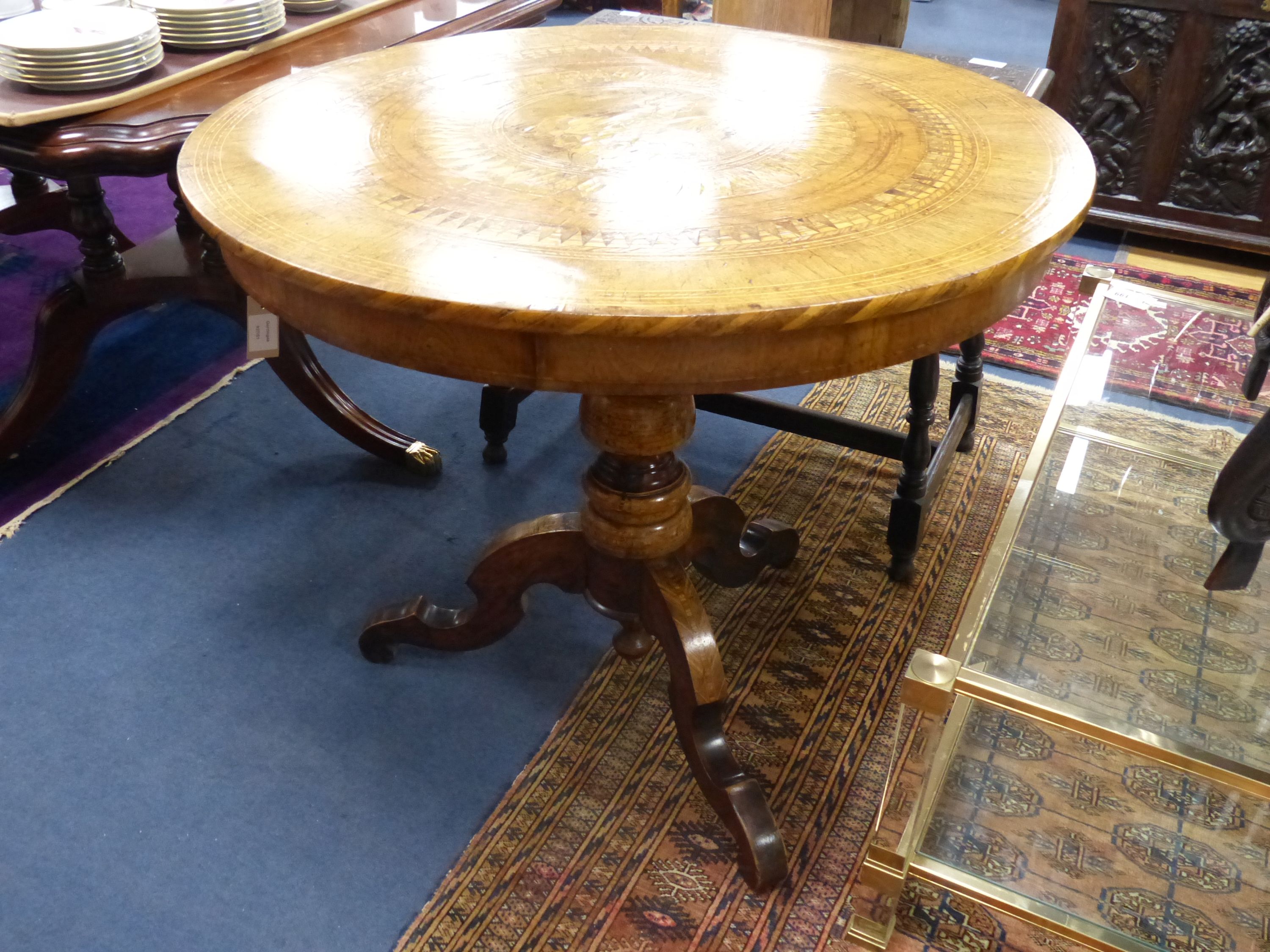 A 19th century Sorrento inlaid table, decorated centrally with a scene of St. George slaying the dragon, diameter 89cm, height 77cm